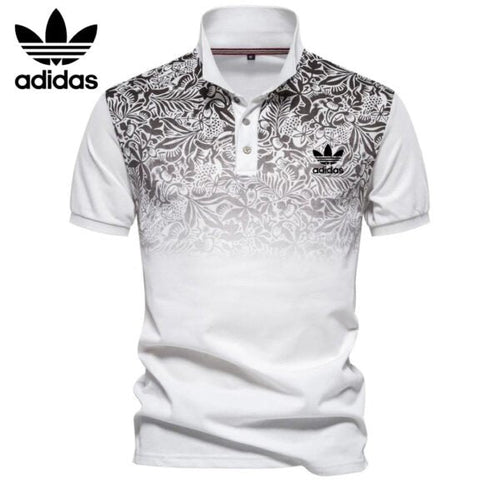AD – Polo con motivo floreale sfumato