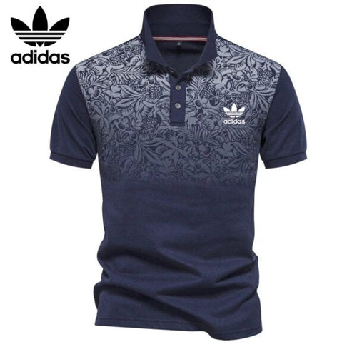 AD – Polo con motivo floreale sfumato